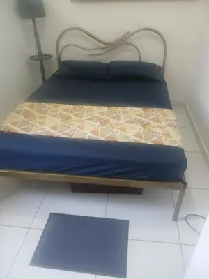 Uma cama ou camas num quarto em Aluguel de 1 quarto aconchegante com ar de nostalgia