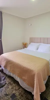 Uma cama ou camas num quarto em Hotel Brasil PREMIUM 604