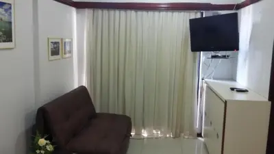 Uma televisão e/ou sistema de entretenimento em Villa Costeira Beira Mar