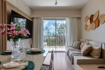 Uma área de estar em Beach Park Living Vista Mar