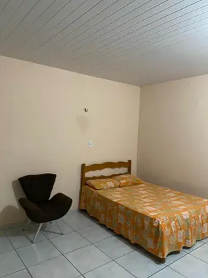 Uma cama ou camas num quarto em Kit net Baturité
