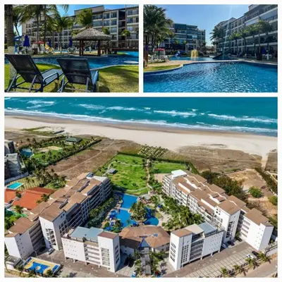 A piscina em ou perto de Raridade do Beach Park Living Pé na areia e vista mar
