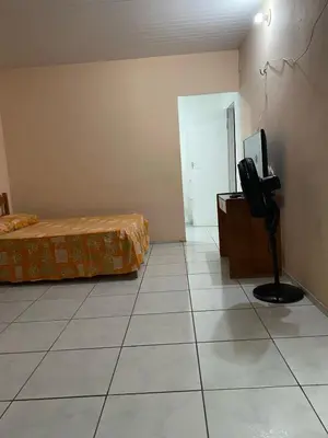Uma cama ou camas num quarto em Quarto Baturité