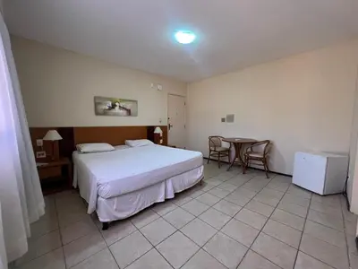 Uma cama ou camas num quarto em Paraíso no Aquaville Resort 1