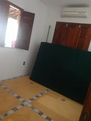 Uma cama ou camas num quarto em Casa frente ao mar em Icapuí
