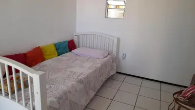 Uma cama ou camas num quarto em Apartamento aconchegante na Cidade 2000