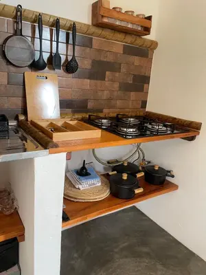 A cozinha ou kitchenette de Aquarela Lofts em Icaraizinho