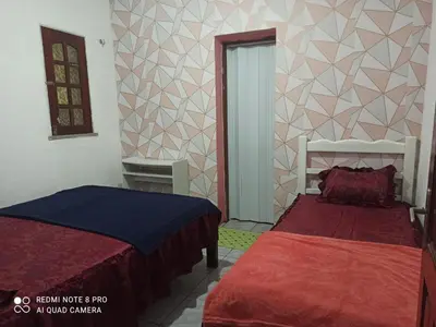 Uma cama ou camas num quarto em Chácara da Lilian