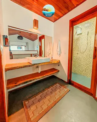 Uma cama ou camas num quarto em Pousada no Mar