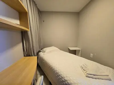 Uma cama ou camas num quarto em Emílio Hinko 2304 Mucuripe andar alto perto Beira Mar