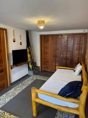 Uma cama ou camas num quarto em Vila Dos Ventos