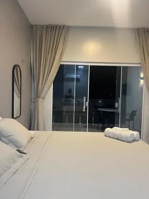 Uma cama ou camas num quarto em Villa brisa icaraizinho Quarto 6 andar superior