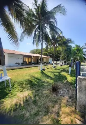 Um jardim no exterior de APARTAMENTO Cd Marina 3 Praia Morro Branco CE