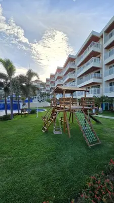 A área de jogos para crianças em Apartamento em Solarium Residence