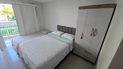Uma cama ou camas num quarto em Apartamento em Solarium Residence