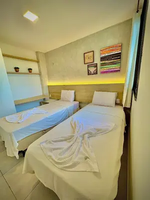 Uma cama ou camas num quarto em Wai Wai Cumbuco por Casamarinn