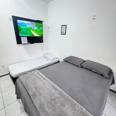 Ap em bairro nobre com garagem e ar