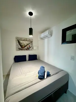 Uma cama ou camas num quarto em 504 Ocean Tower Vista mar