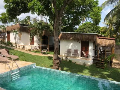 A piscina em ou perto de Villa Albergaria Icaraizinho