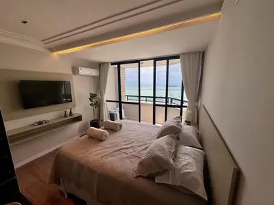 Uma cama ou camas num quarto em Suíte com varanda frente Mar - Golden Fortaleza-16513