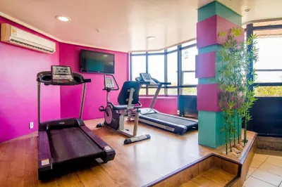 O centro de fitness e/ou as comodidades de fitness de Suíte com varanda frente Mar - Golden Fortaleza-16513