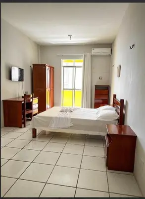 Uma cama ou camas num quarto em Hotel e Flat Sobral Mundi