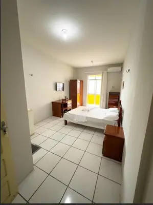 Uma cama ou camas num quarto em Hotel e Flat Sobral Mundi
