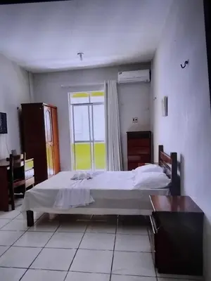 Uma cama ou camas num quarto em Hotel e Flat Sobral Mundi