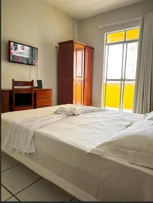 Uma cama ou camas num quarto em Hotel e Flat Sobral Mundi