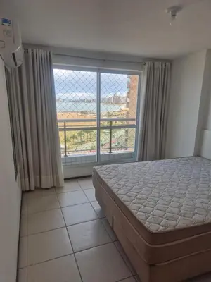 Uma cama ou camas num quarto em Fortaleza vista mar Terraços do ATLÂNTICO
