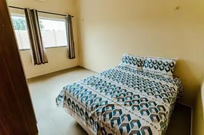 Uma cama ou camas num quarto em Casa em barra nova