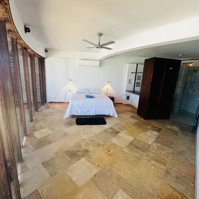 Uma cama ou camas num quarto em Chácara Atlântica