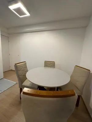Uma área de estar em Apartamento Frente a Praia