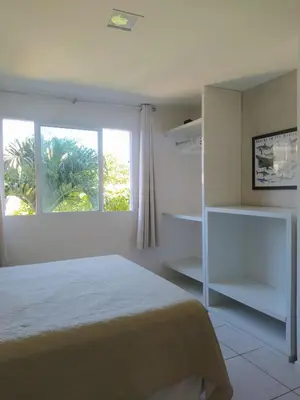 Uma cama ou camas num quarto em Apartamento Porto das Dunas