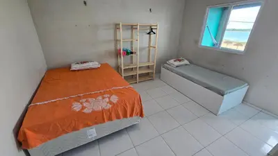 Uma cama ou camas num quarto em Pousada Madri