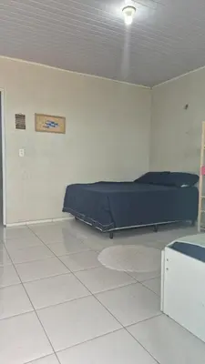 Uma cama ou camas num quarto em Pousada Madri