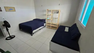 Uma cama ou camas num quarto em Pousada Madri