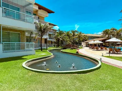 A piscina em ou perto de Porto das Dunas Apê na Areia com Banheira, lazer total e estrutura de praia para toda a Família