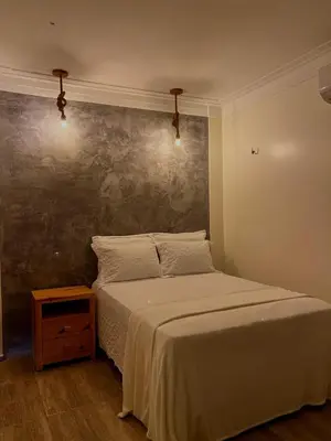 Uma cama ou camas num quarto em Village Choça