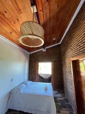 Uma cama ou camas num quarto em Village Choça