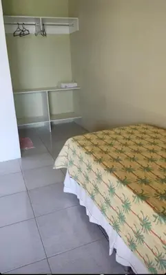 Uma cama ou camas num quarto em Flecheiras- Davitória