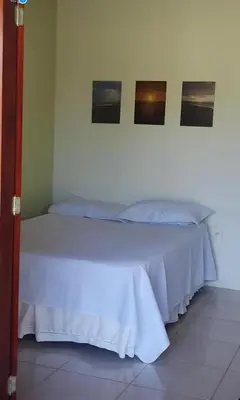 Uma cama ou camas num quarto em Flecheiras- Davitória