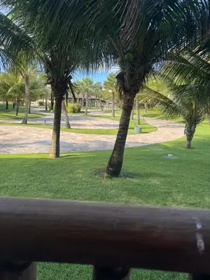 Um jardim no exterior de GV Sun Cumbuco C2 105
