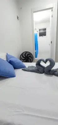 Uma cama ou camas num quarto em Apartamento vista para o mar, Fortaleza CE 3 Quartos