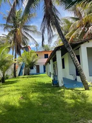 Um jardim no exterior de Pousada Bê kite cauipe