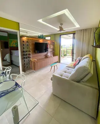 Uma televisão e/ou sistema de entretenimento em Wai Wai Cumbuco Ocean View Pé na Areia
