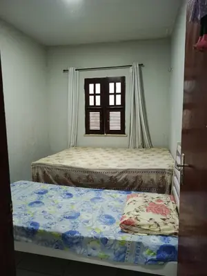 Uma cama ou camas num quarto em Chalé João Pequeno
