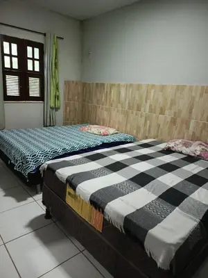Uma cama ou camas num quarto em Chalé João Pequeno