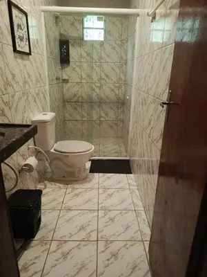 Uma casa de banho em Chalé João Pequeno