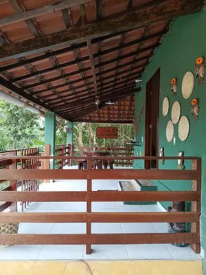 Um restaurante ou outro lugar para comer em Chalé João Pequeno